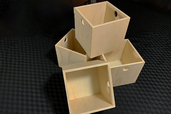 Assorted wooden timber storage crates